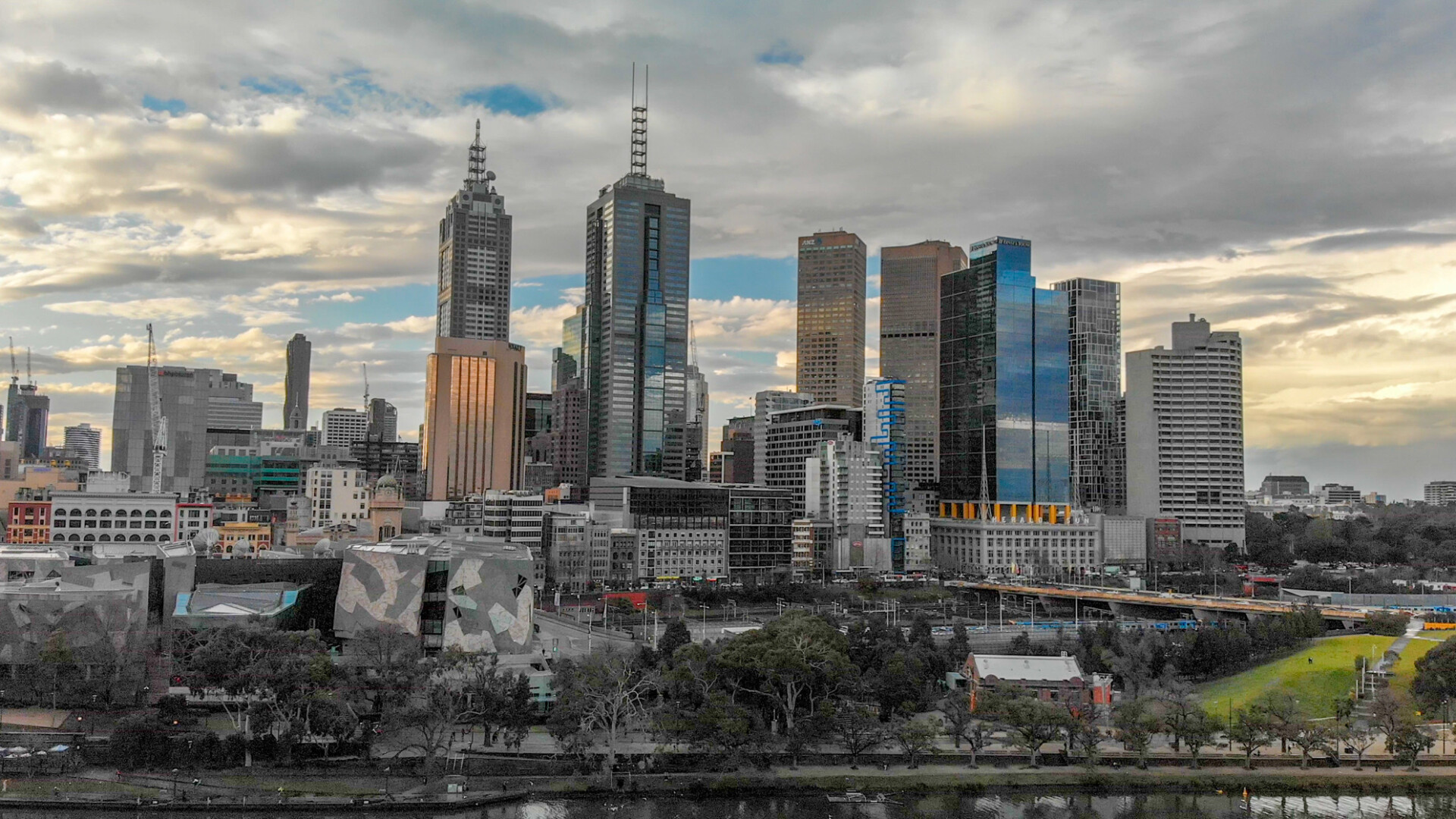 MELBOURNE, AUSTRALIA - SEPTEMBER 6, 2018: Aerial view of cityscape at sunset. More than 15 million tourists visit Melbourne annually.