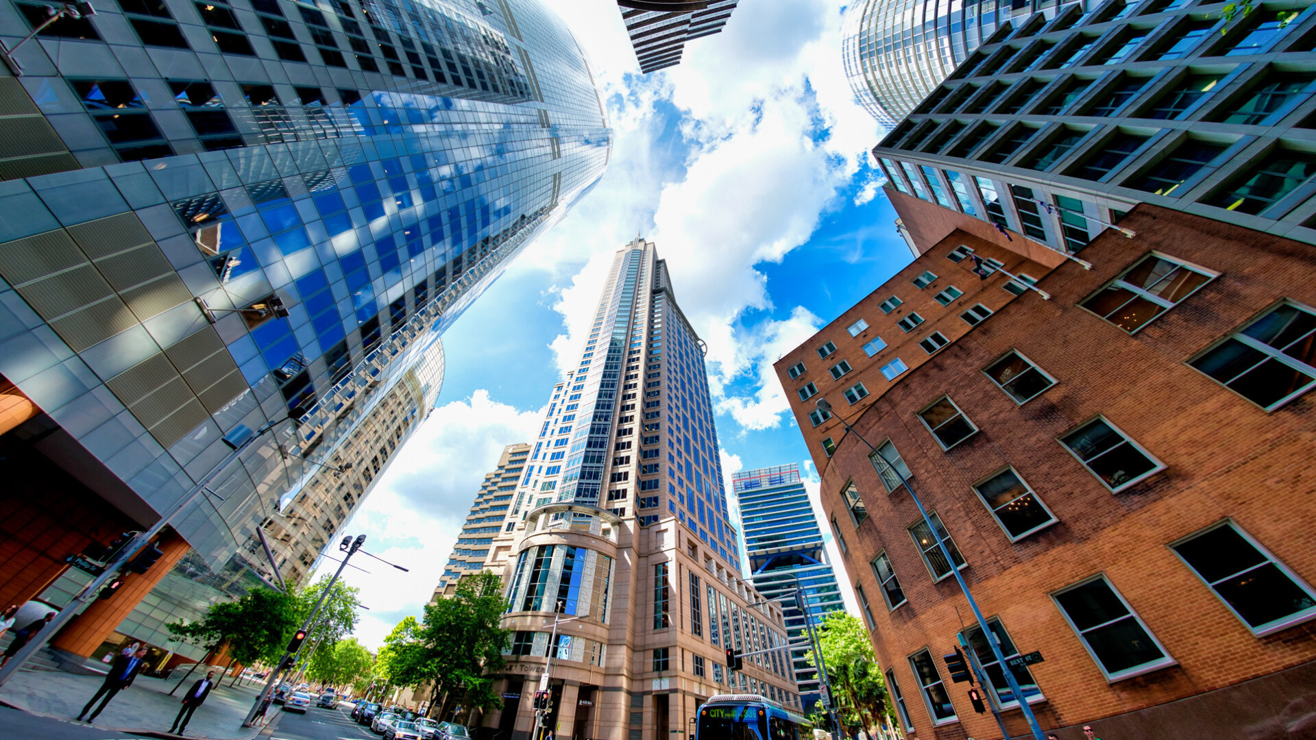 SYDNEY - OCTOBER 2015: City buildings on a beautiful sunny day. The city attracts 20 million people annually.