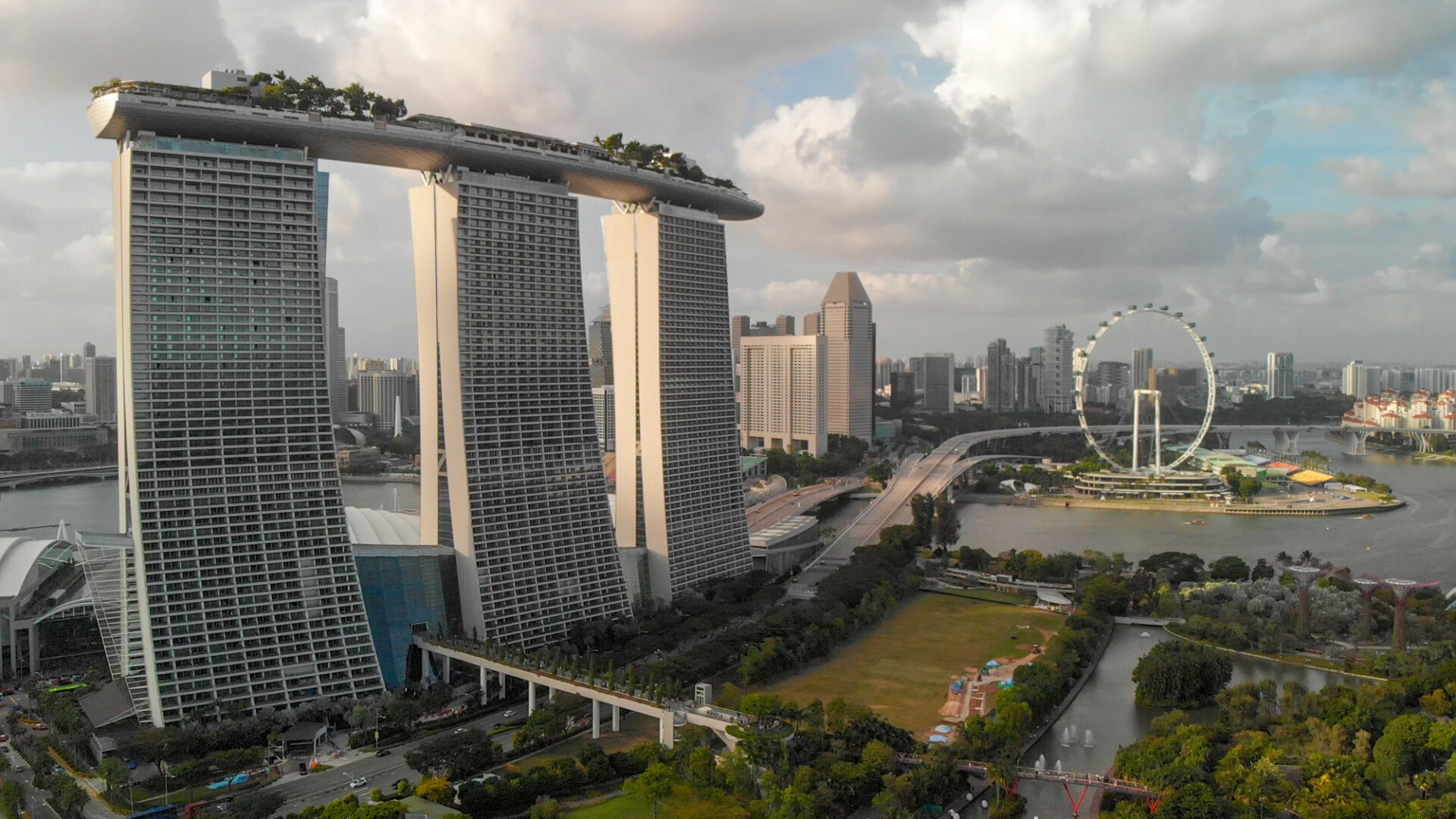 SINGAPORE - JANUARY 3RD, 2020: Drone viewpoint on Marina Bay Sands and city skyline on a sunny afternoon