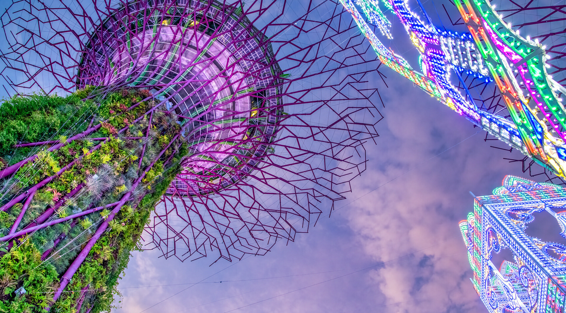 SINGAPORE - JANUARY 1ST, 2020: Garden Rhapsody light shows in the Supertree Grove, Gardens By The Bay city park, located in Marina Bay area