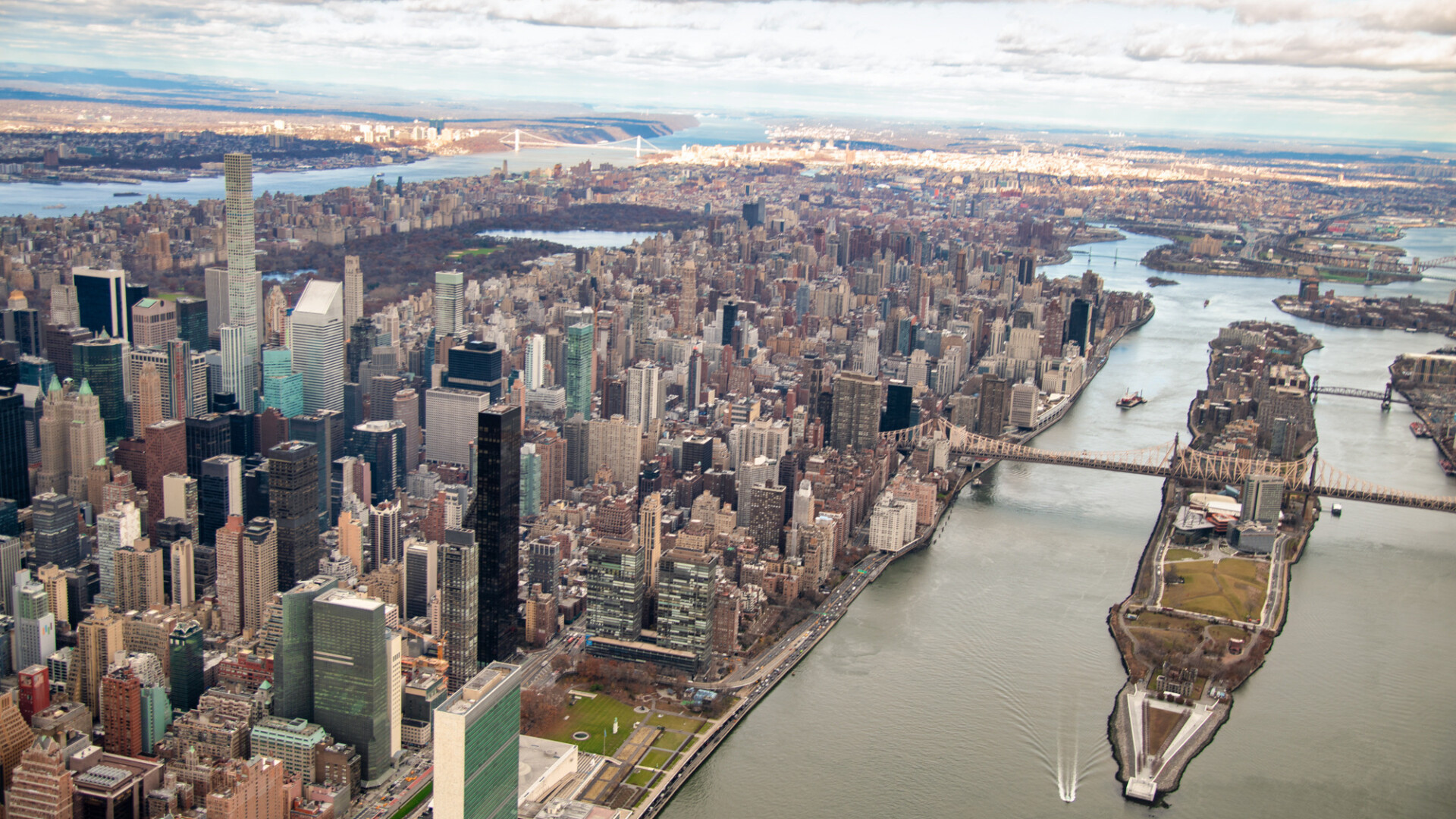 NEW YORK CITY - DECEMBER 3rd, 2018: Manhattan and East River aerial view from helicopter, New York City. Midtown from a high vantage point - New York City - NY - USA