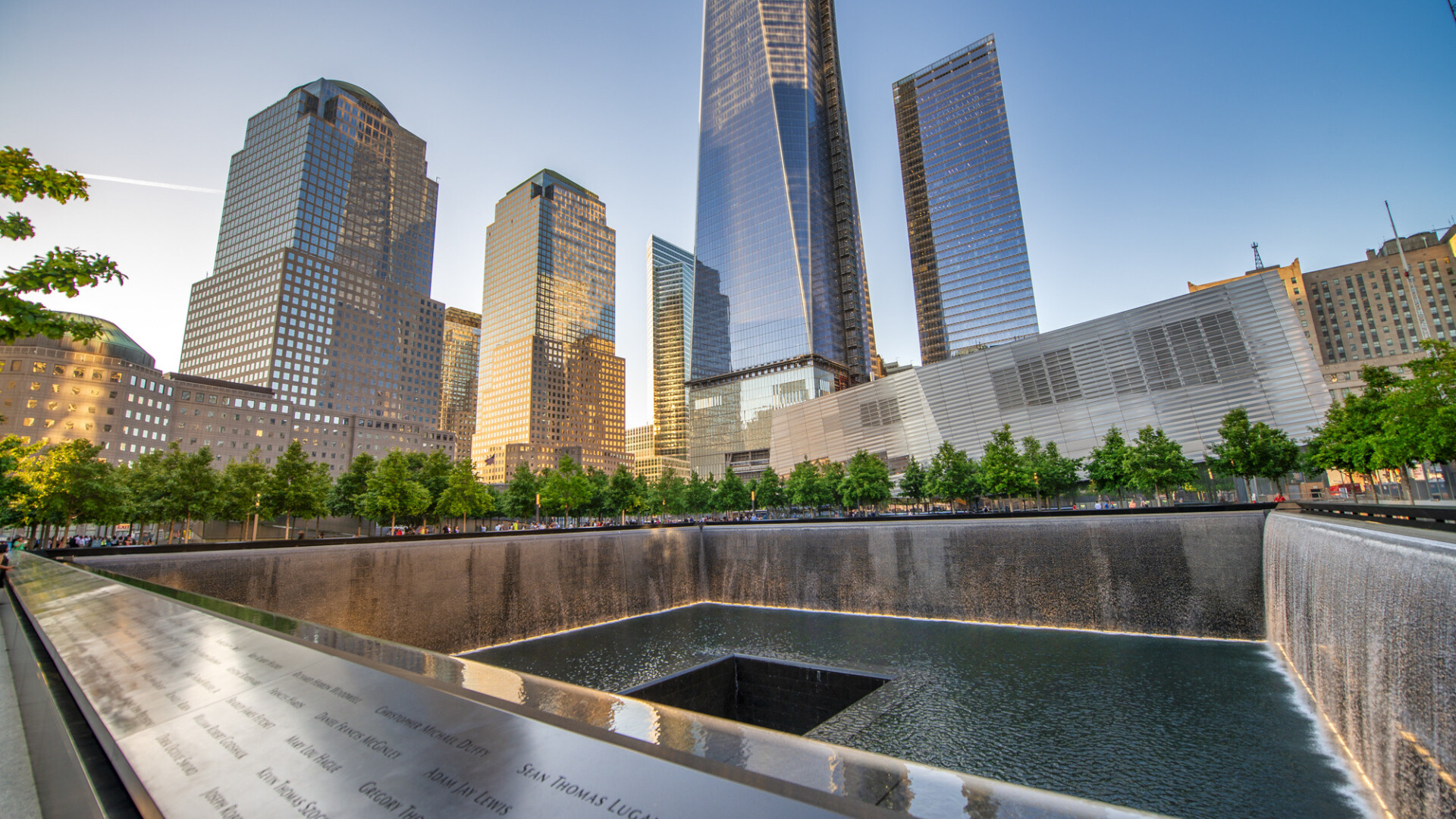 NEW YORK CITY - JUNE 2013: World Trade Center on a beautiful sunny day. It replaces the original seven buildings on the same site that were destroyed in the September 11 attacks